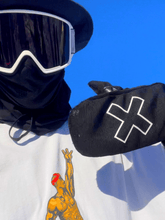 Load image into Gallery viewer, A candid picture of the Sweetmitts Stealth X Mitts paired with a Sweetmitts black wide-brim hat showcasing a steezy blacked out fit that is really sleek and stylish for any skier or snowboarder to rock. The black stealth X mitts are the best snow mittens and pair with any snow outfit.
